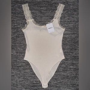 Forever 21 Cream knit lace bodysuit (Never worn)